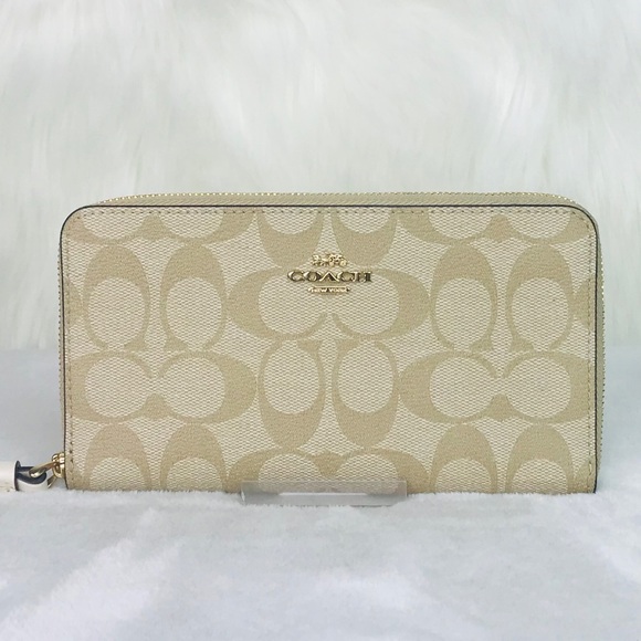 Coach Handbags - Coach Signature Large Phone Wallet